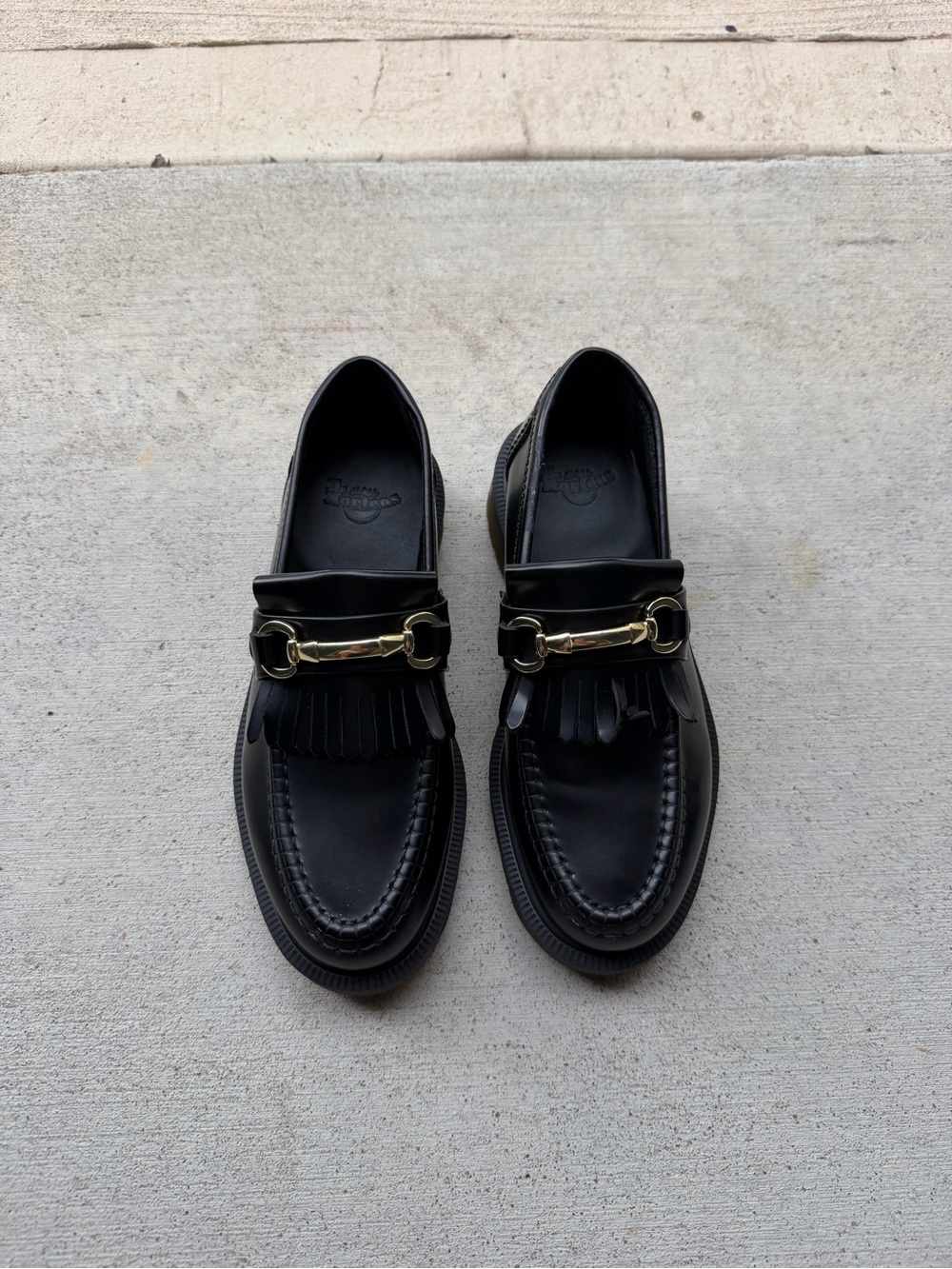 Dr. Martens Black Leather Tassel Loafers with Gold Bit